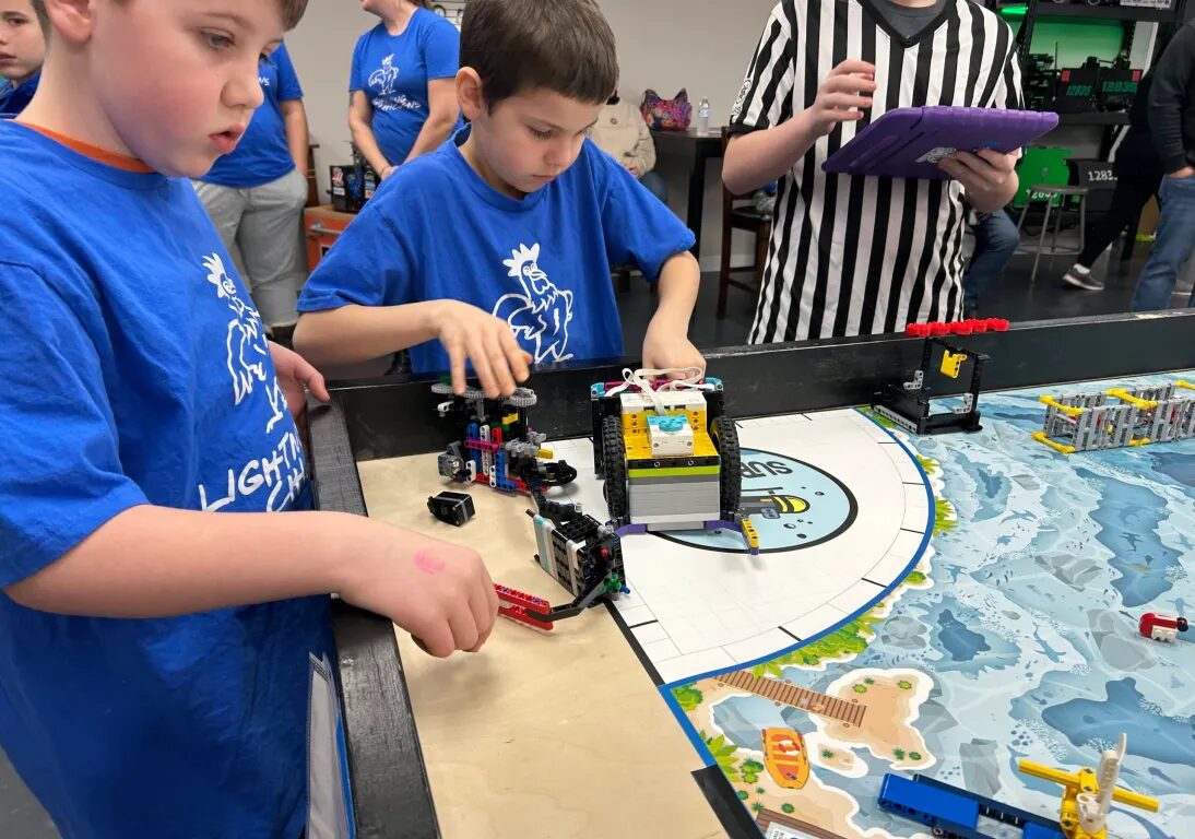 Children competing with Legos